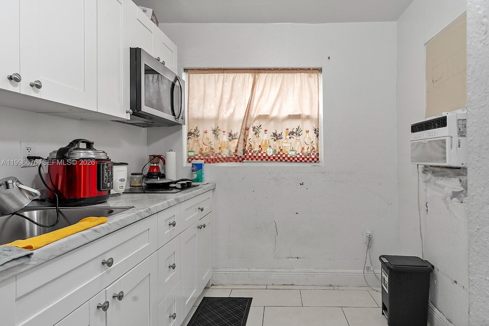 3035 NW 93rd St, Miami FL 33147 — 32