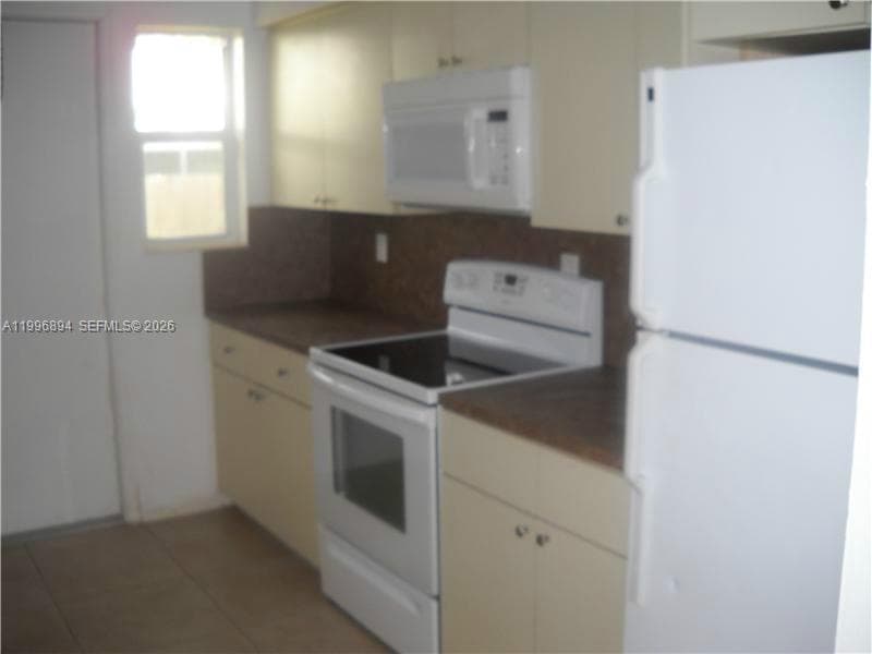 1040 92 ST # 3, Bay Harbor Islands FL 33154 — 4