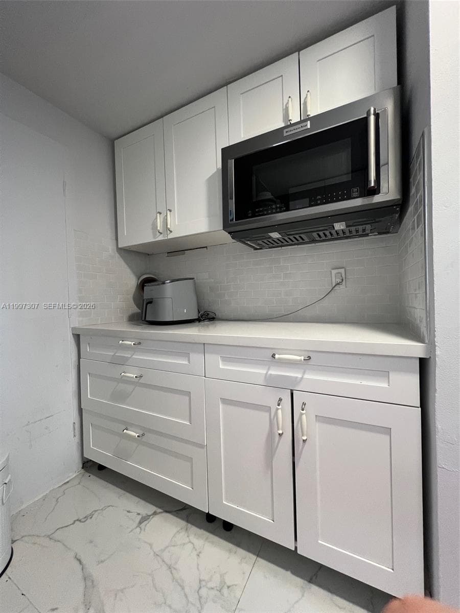 880 NE 69th St # 11M, Miami FL 33138 — 9