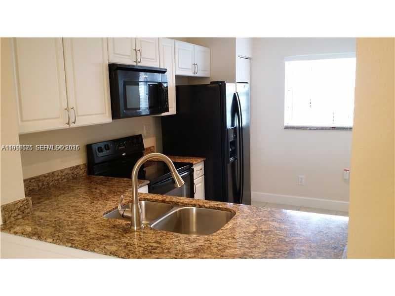 438 NE 210th Cir Ter # 4B, Miami FL 33179 — 2