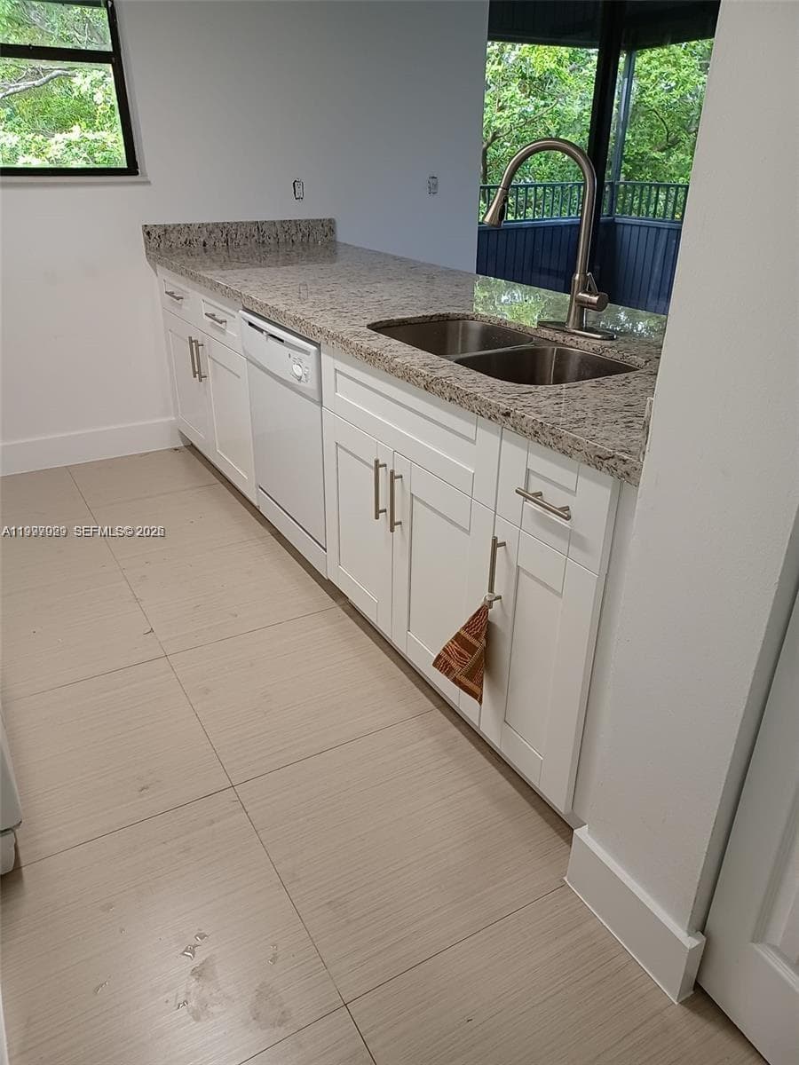 16220 NW 2nd Ave # 411, Miami FL 33169 — 3