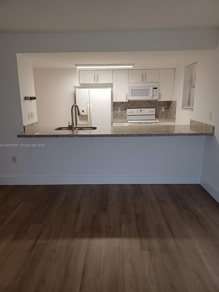 16220 NW 2nd Ave # 411, Miami FL 33169 — 5