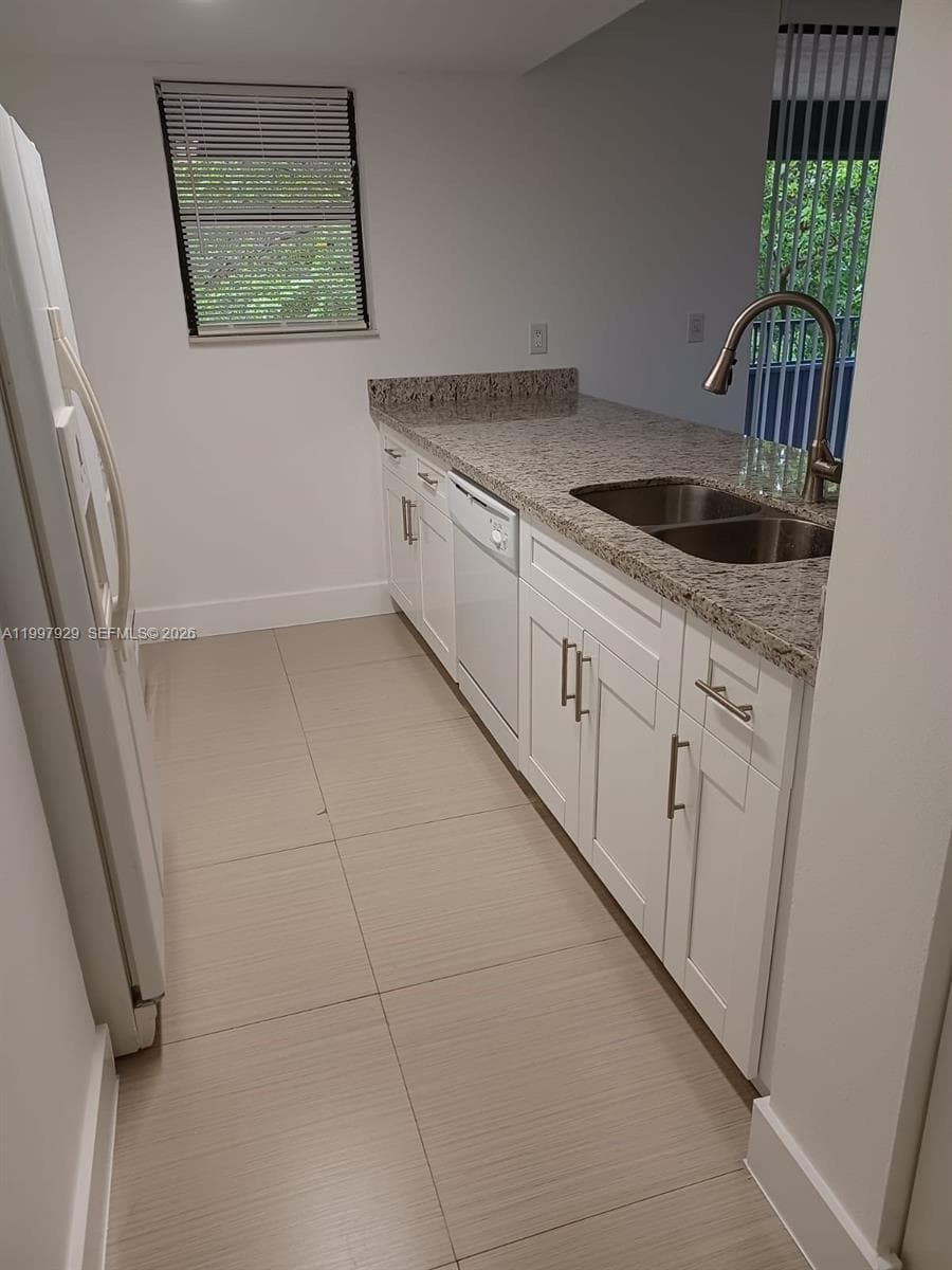 16220 NW 2nd Ave # 411, Miami FL 33169 — 4