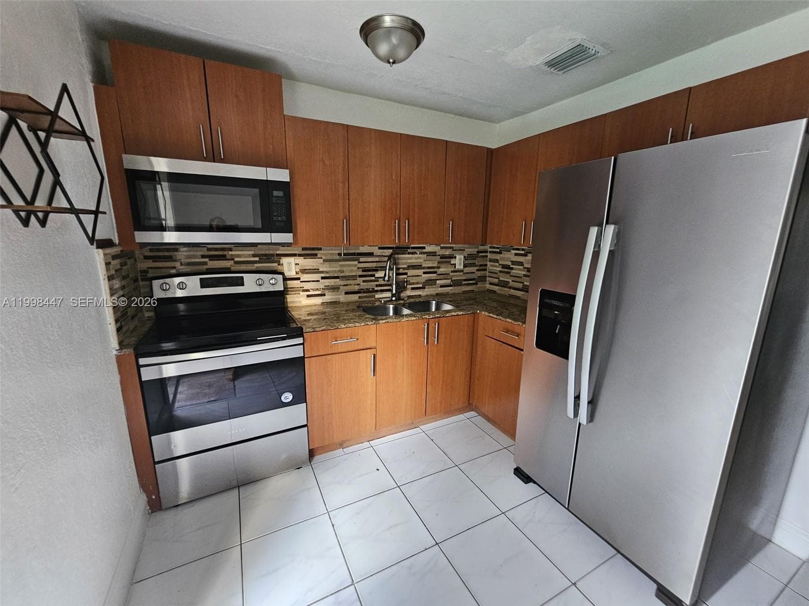 1857 NW 113th Ter # 1857, Miami FL 33167 — 5