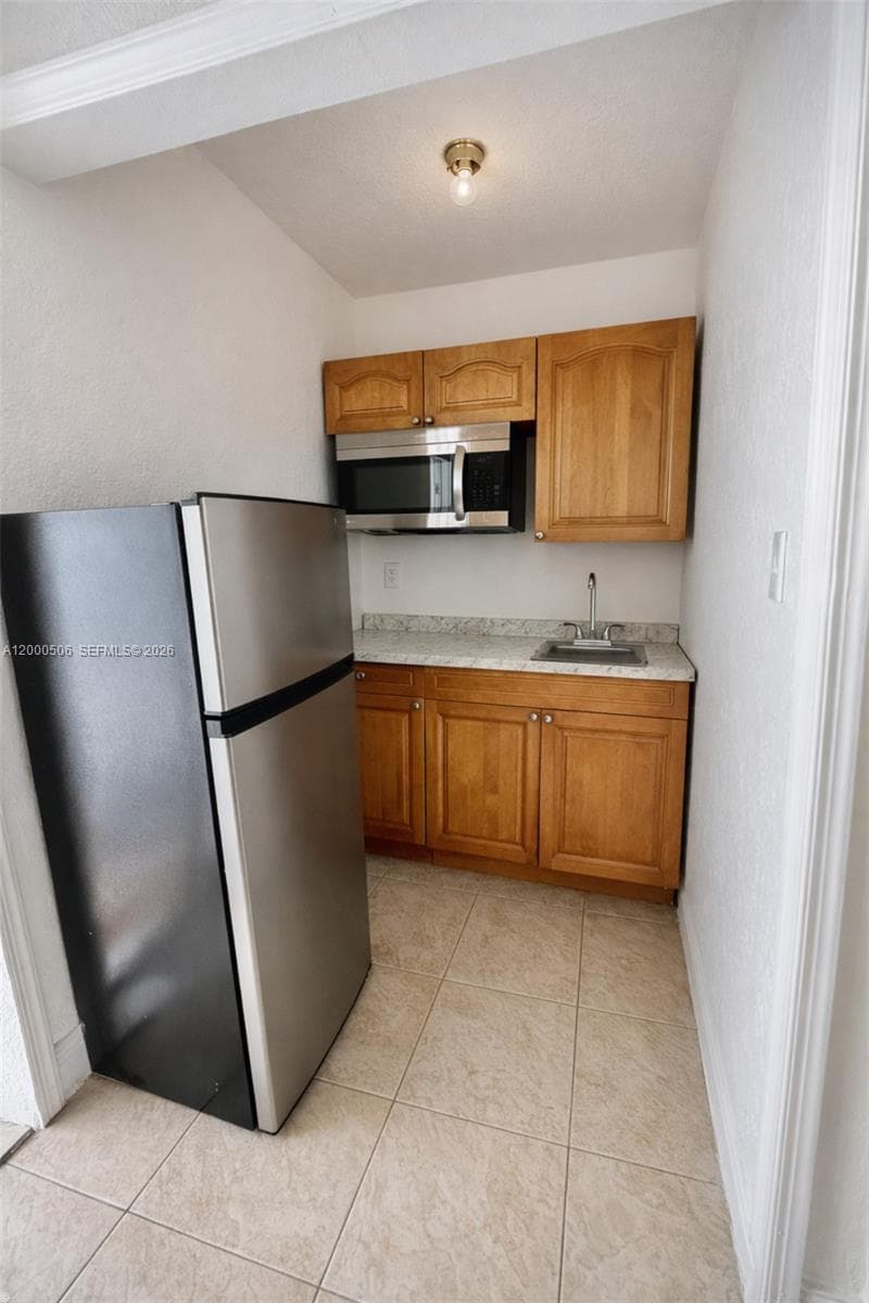 2471 NW 18th Ter # A, Miami FL 33125 — 7