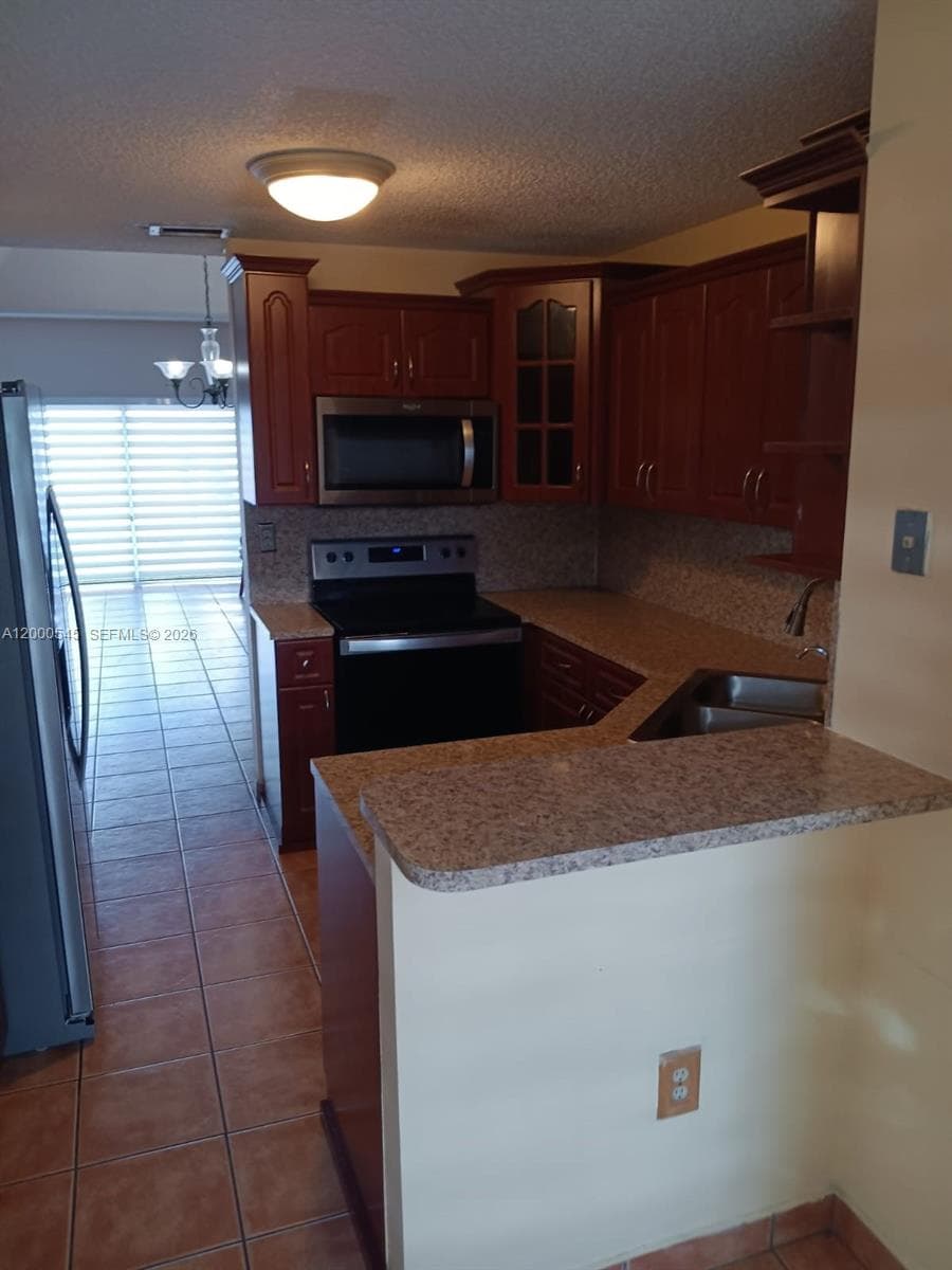 14345 SW 57th Ln # 14, Miami FL 33183 — 11