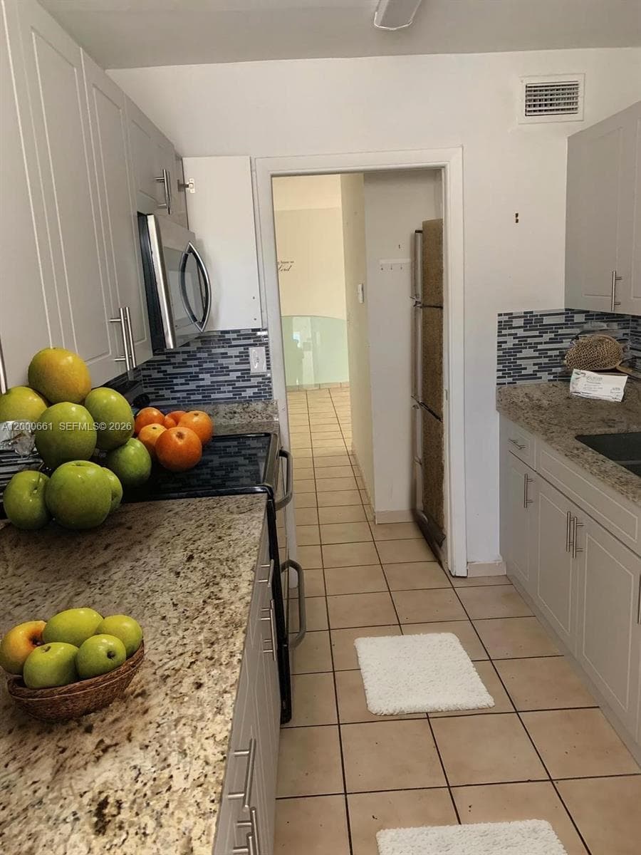 7345 W 4th Ave # 203, Hialeah FL 33014 — 3