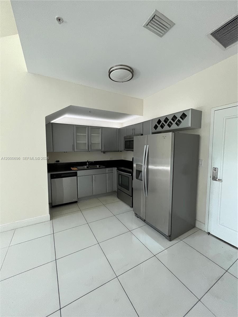 1871 NW S River Dr # A03, Miami FL 33125 — 11