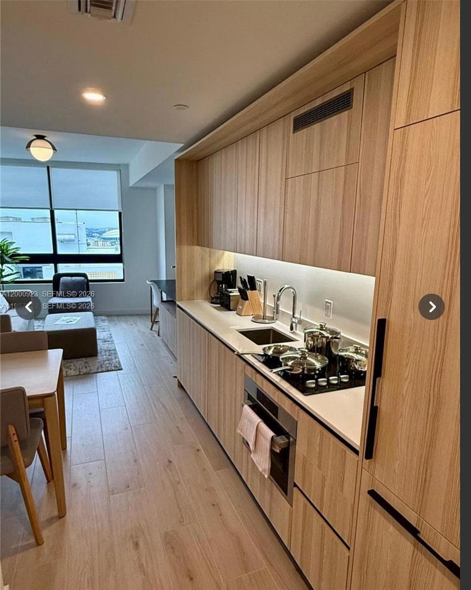 225 N Miami Ave # 212, Miami FL 33128 — 13