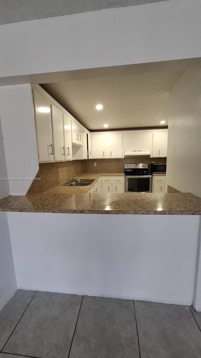 6950 Miami Gardens Dr # 201, Hialeah FL 33015 — 1