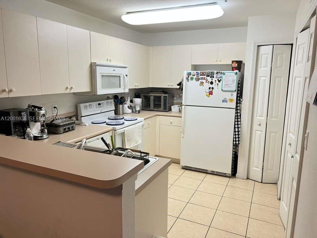 11102 NW 83rd St # 217, Doral FL 33178 — 11