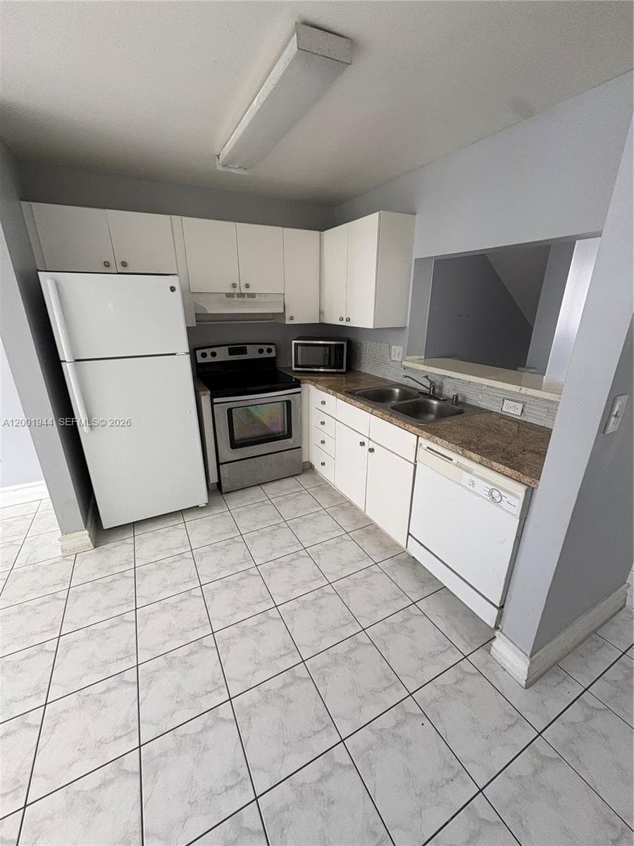 12035 SW 14th St # 105, Miami FL 33184 — 12