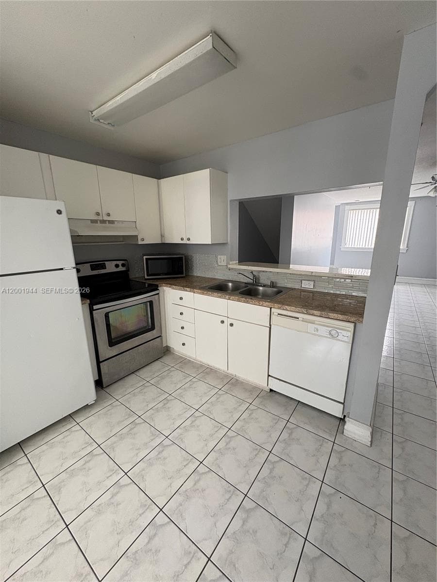 12035 SW 14th St # 105, Miami FL 33184 — 11