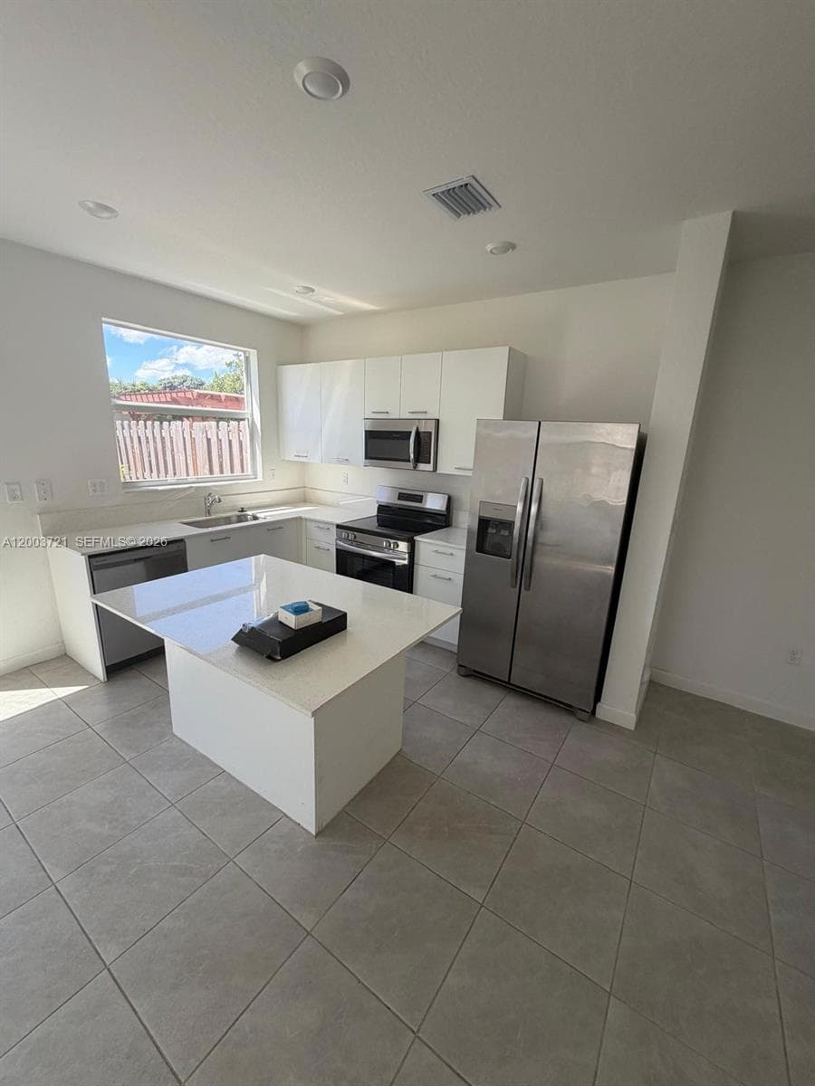 12148 NW 24TH PL # 12148, Miami FL 33167 — 5