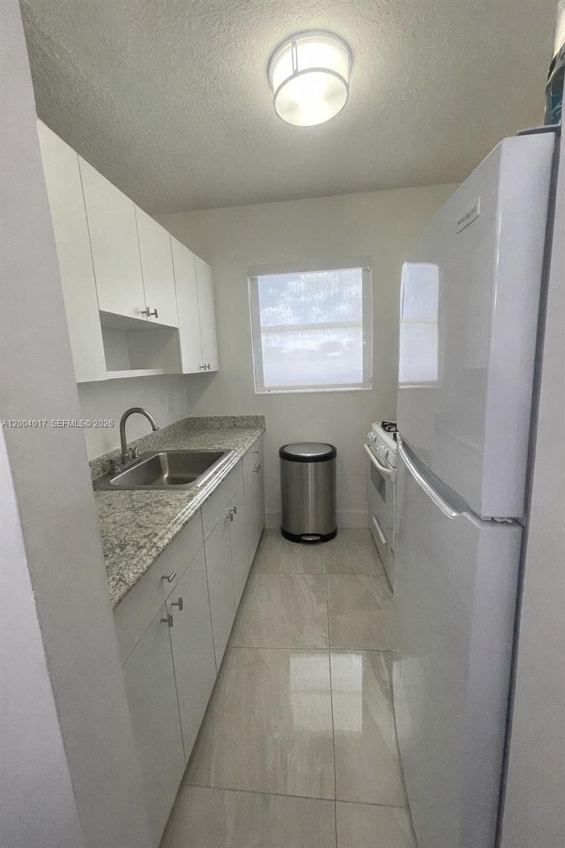 1255 W 49th Pl # E102, Hialeah FL 33012 — 8