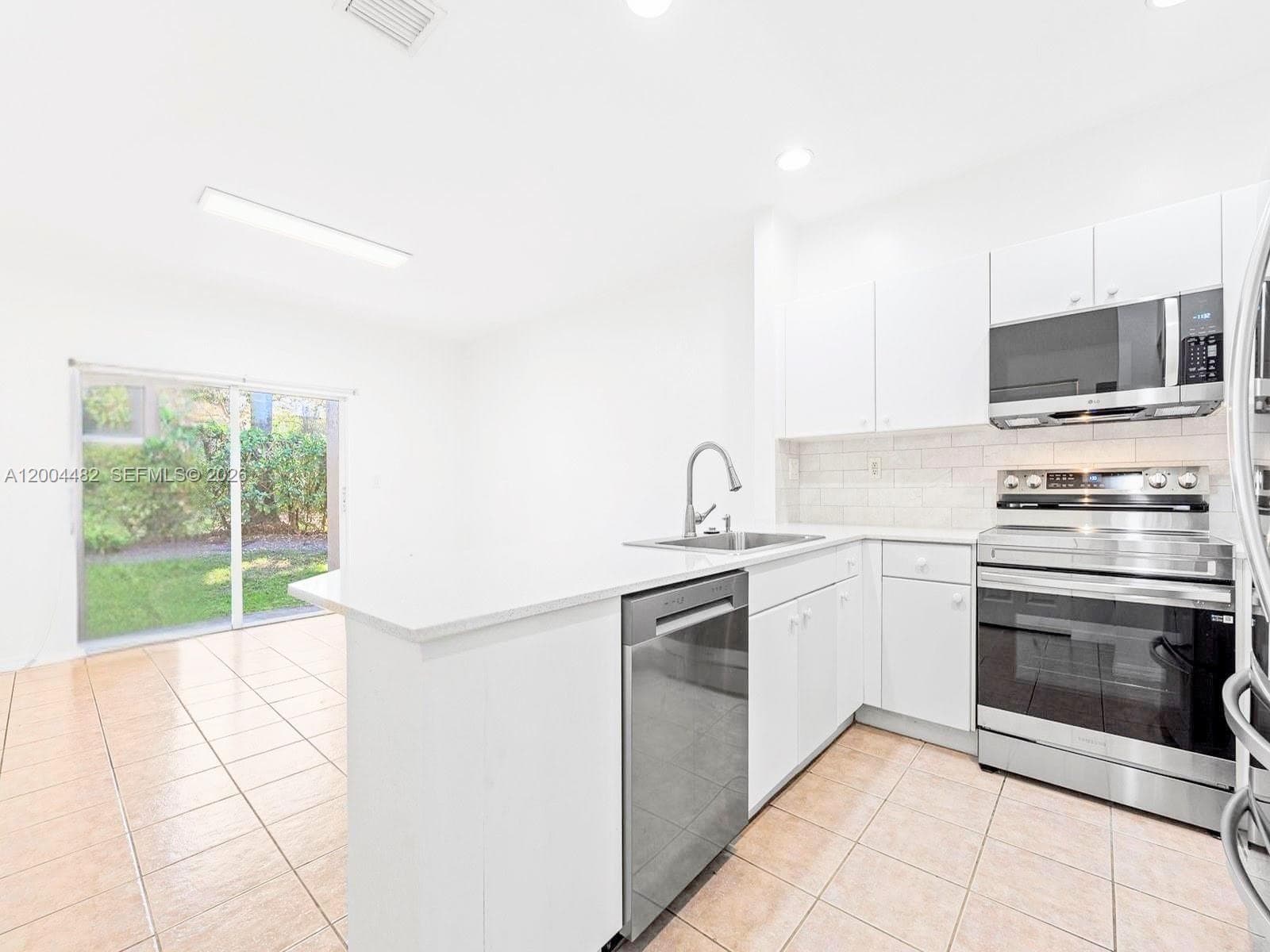 5701 NW 114th Ct # 104, Doral FL 33178 — 4