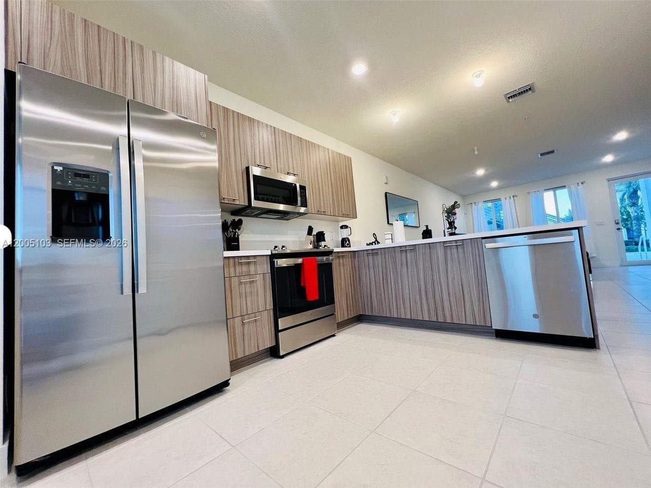 10300 NW 66TH AV # 101, Doral FL 33178 — 1