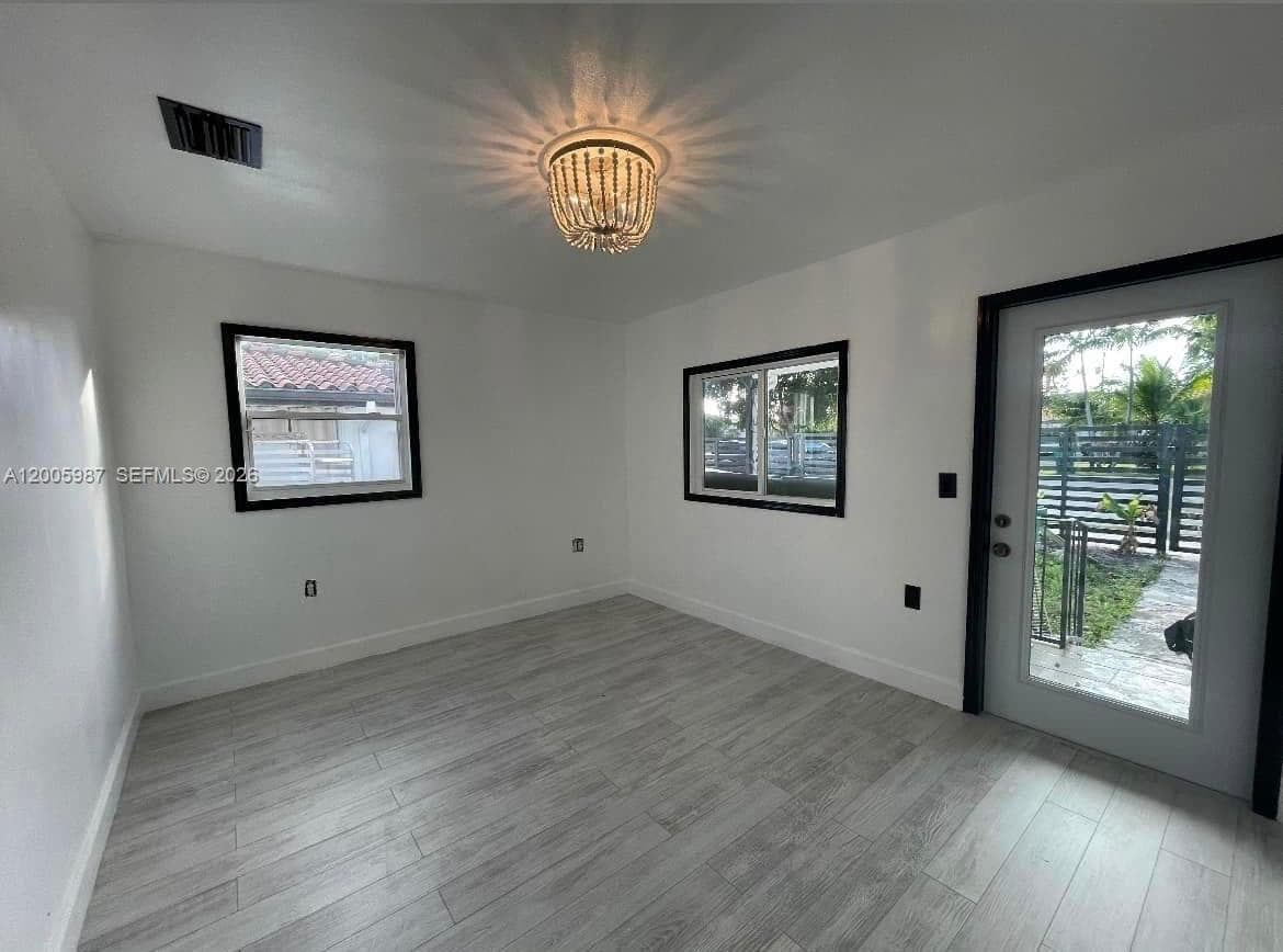 311 NW 32nd Ct, Miami FL 33125 — 3