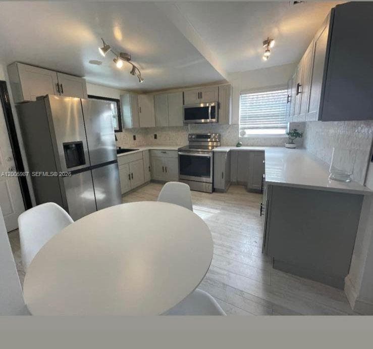 311 NW 32nd Ct, Miami FL 33125 — 5