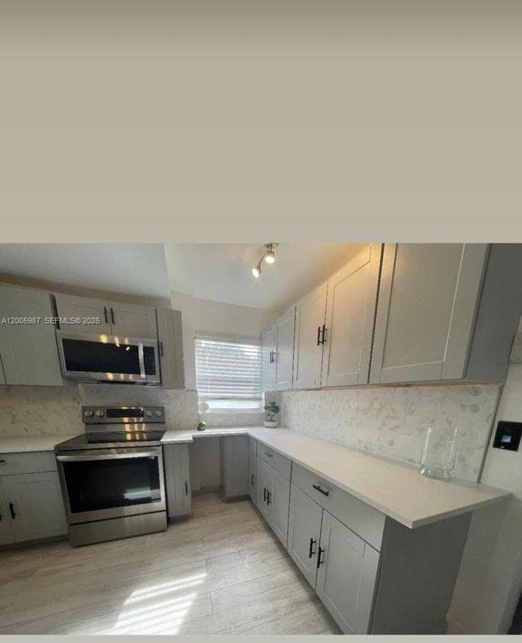 311 NW 32nd Ct, Miami FL 33125 — 9