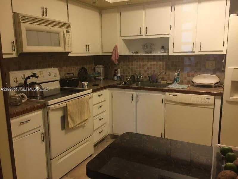 20840 San Simeon Way # 209, Miami FL 33179 — 38