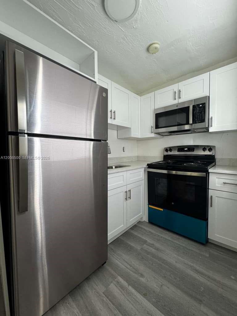 1121 NW 40th St # 1, Miami FL 33127 — 8