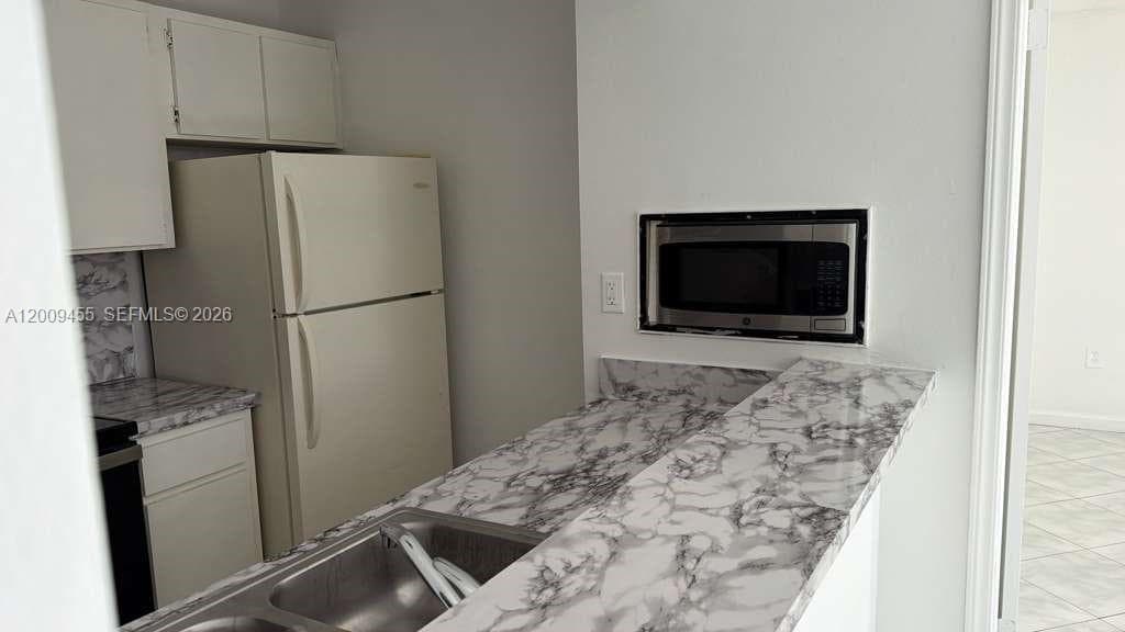 6995 NW 186th St # E507, Hialeah FL 33015 — 16