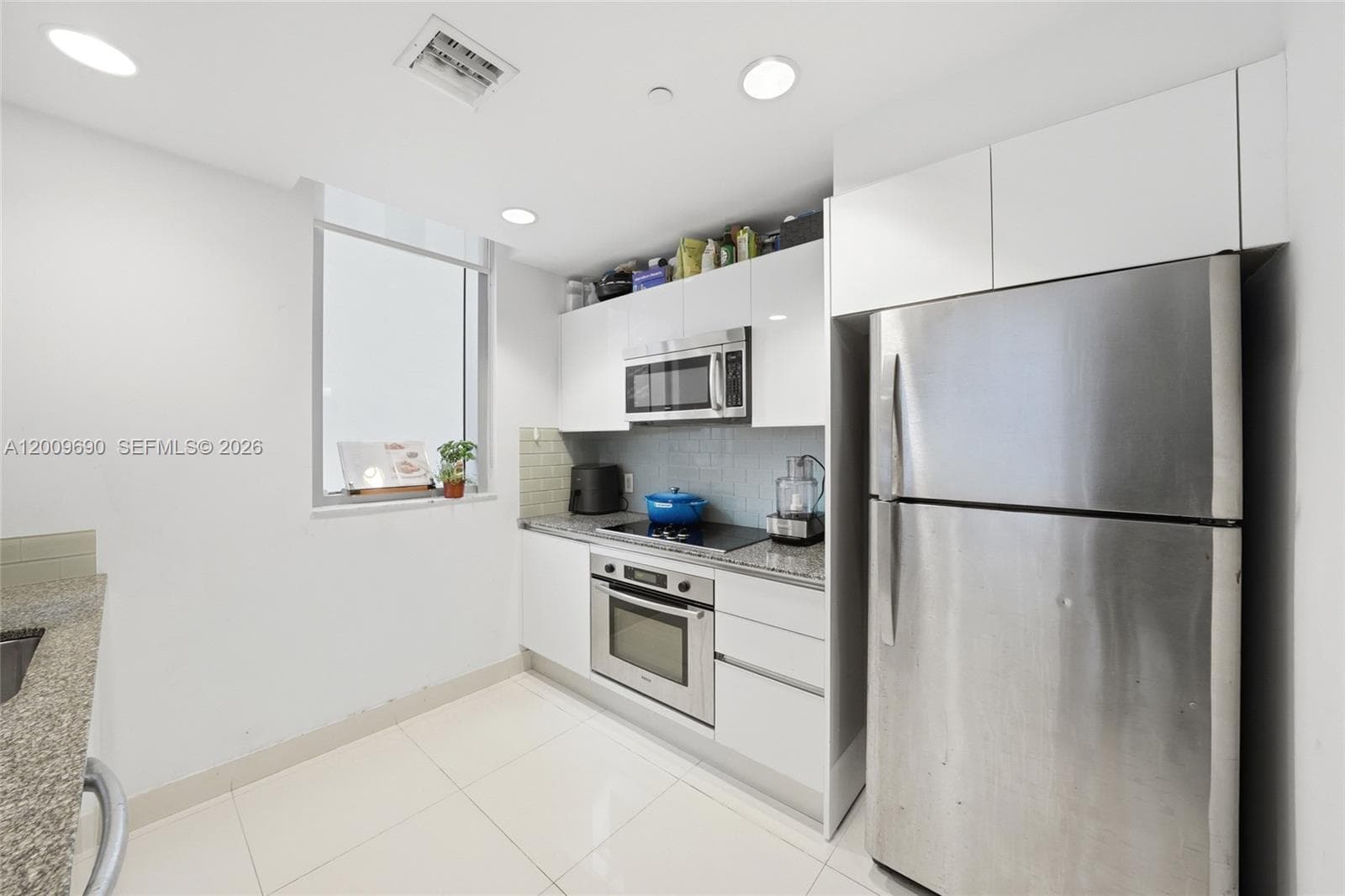 1050 Brickell Ave # 1002, Miami FL 33131 — 5