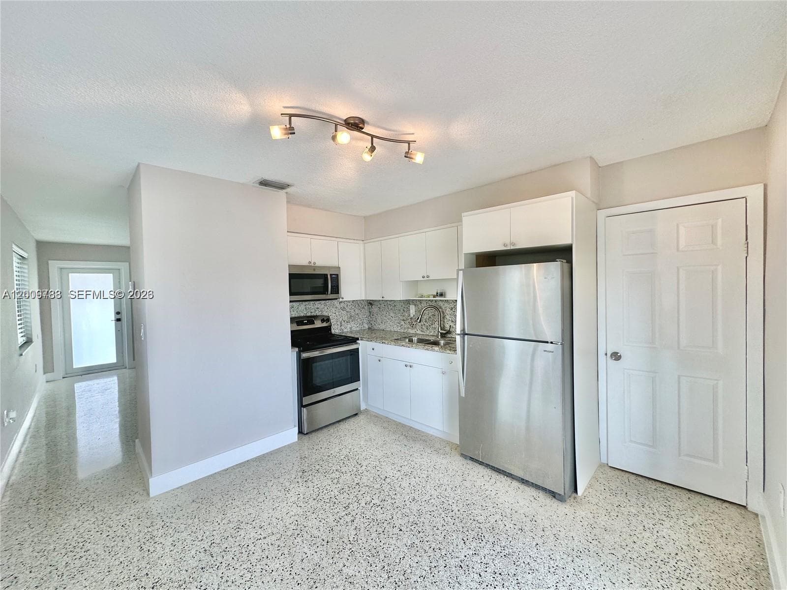 10303 NW 35th Pl, Miami FL 33147 — 3