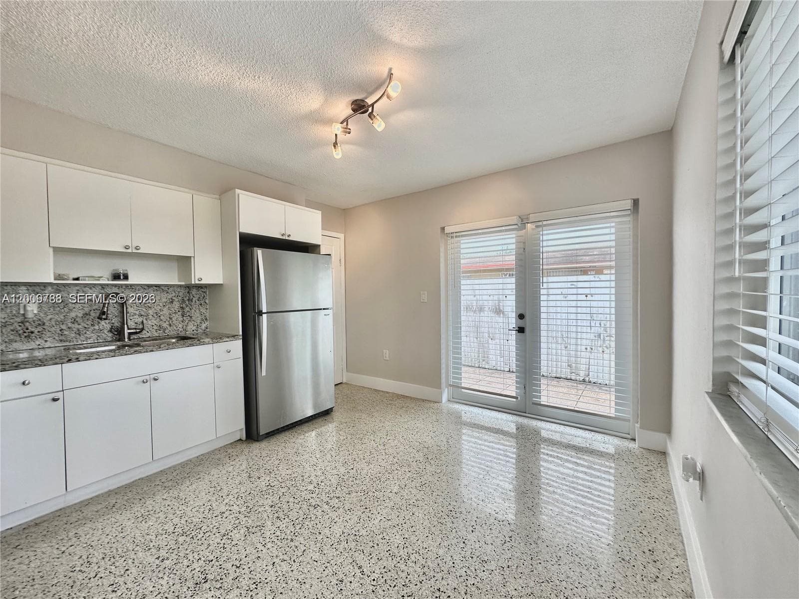 10303 NW 35th Pl, Miami FL 33147 — 5