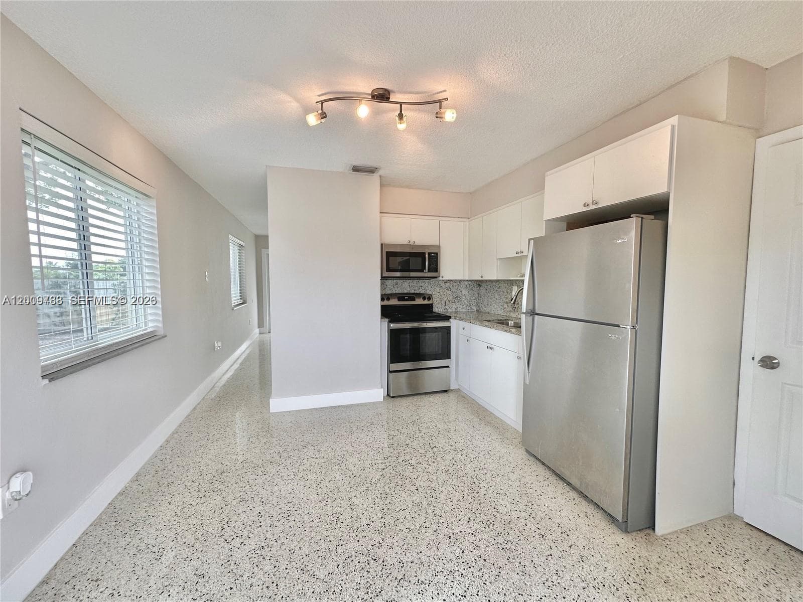 10303 NW 35th Pl, Miami FL 33147 — 14