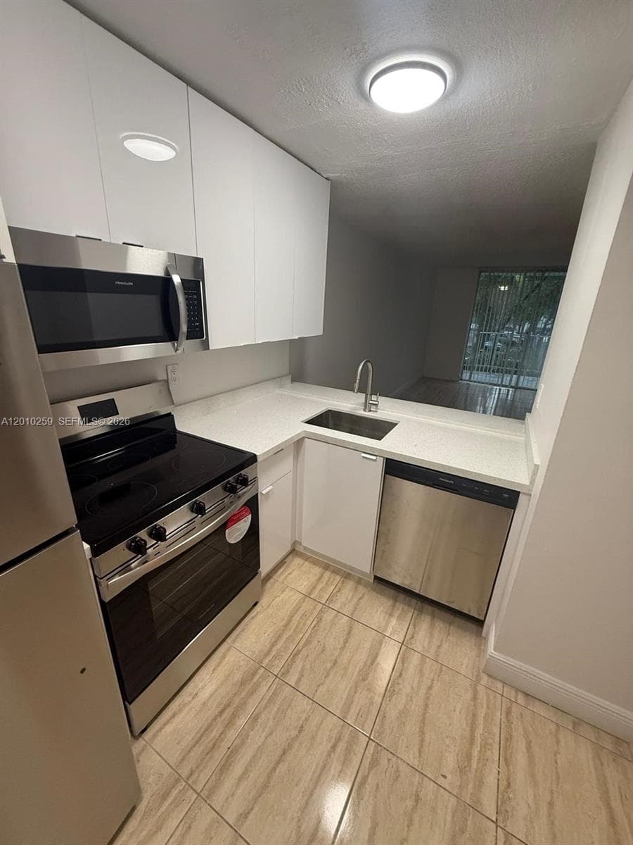 496 NW 165th St Rd # 210, Miami FL 33169 — 5
