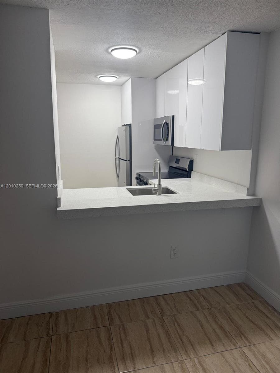 496 NW 165th St Rd # 210, Miami FL 33169 — 9