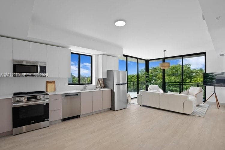 1155 NE 125th St # 106, North Miami FL 33161 — 4
