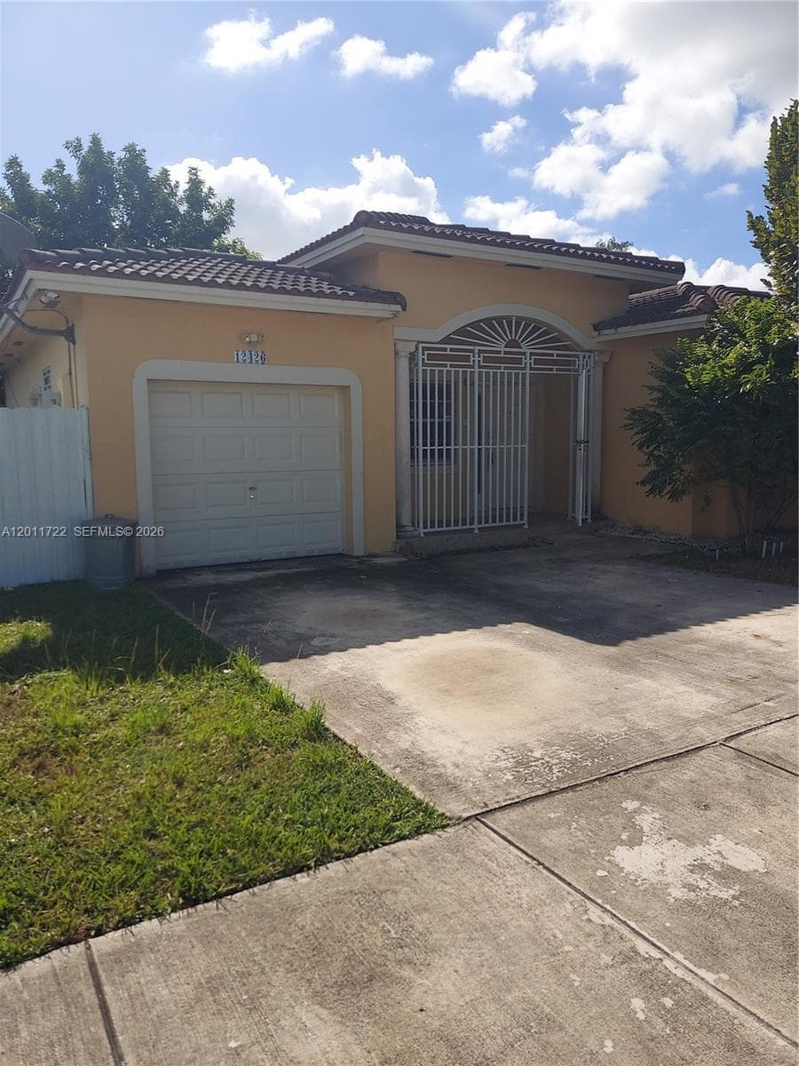 12426 SW 214th Ter # 12426, Miami FL 33177 — 1