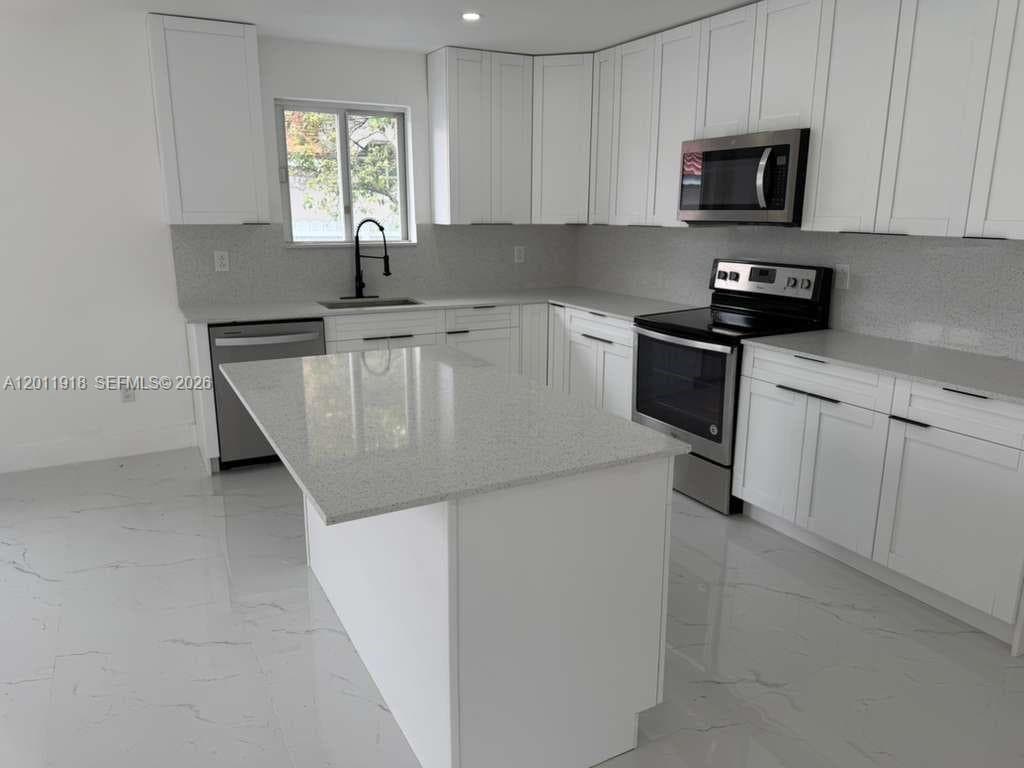3536 NW 14th Ter, Miami FL 33125 — 19