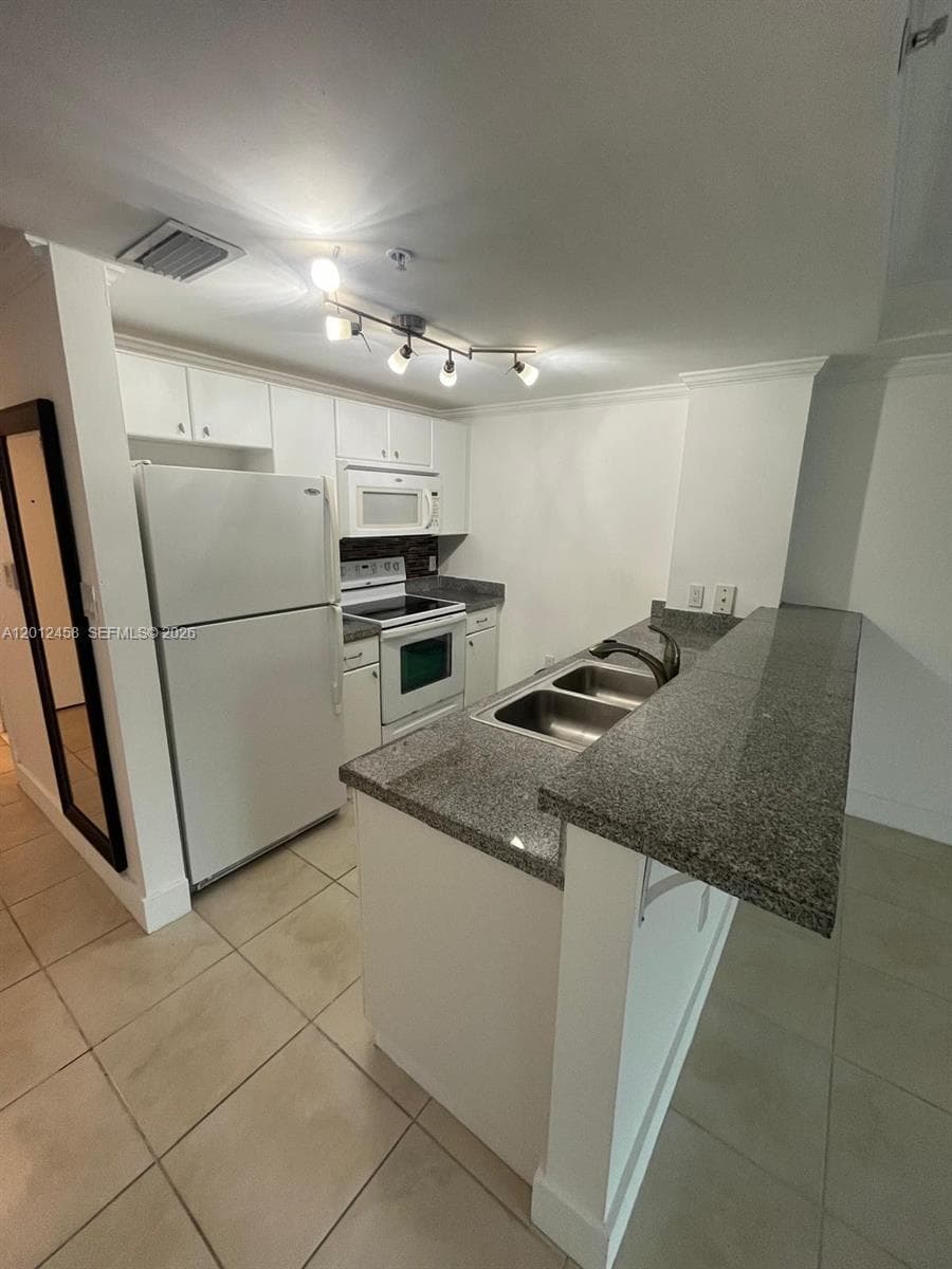 2740 SW 28th Ter # 203, Miami FL 33133 — 8