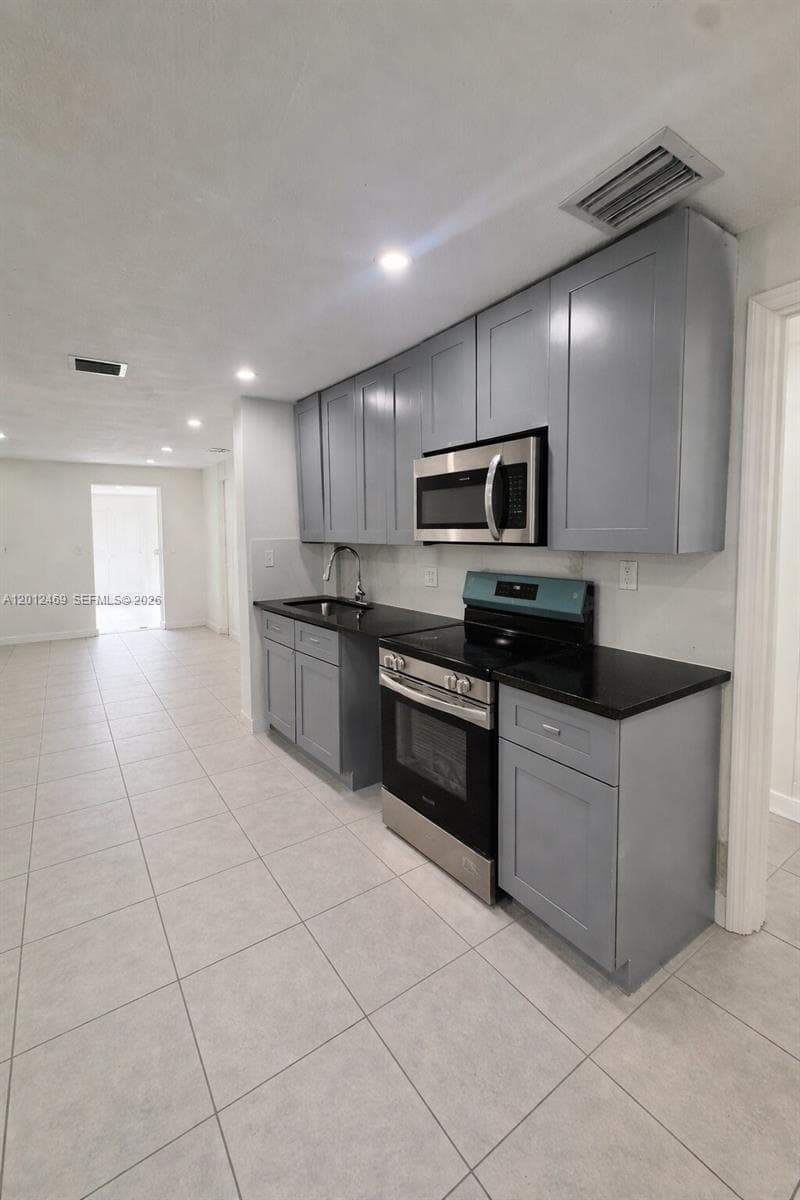 1861 NW 112th St, Miami FL 33167 — 5