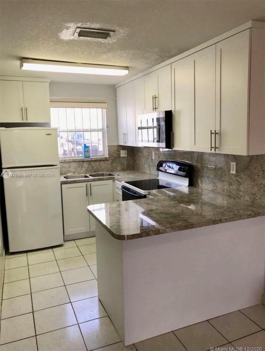 6690 SW 12th St # 6690, West Miami FL 33144 — 4