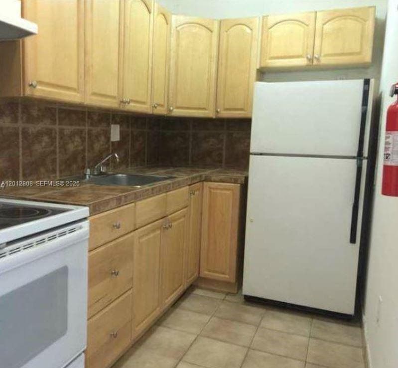 4805 NW 7th # 15, Miami FL 33126 — 2