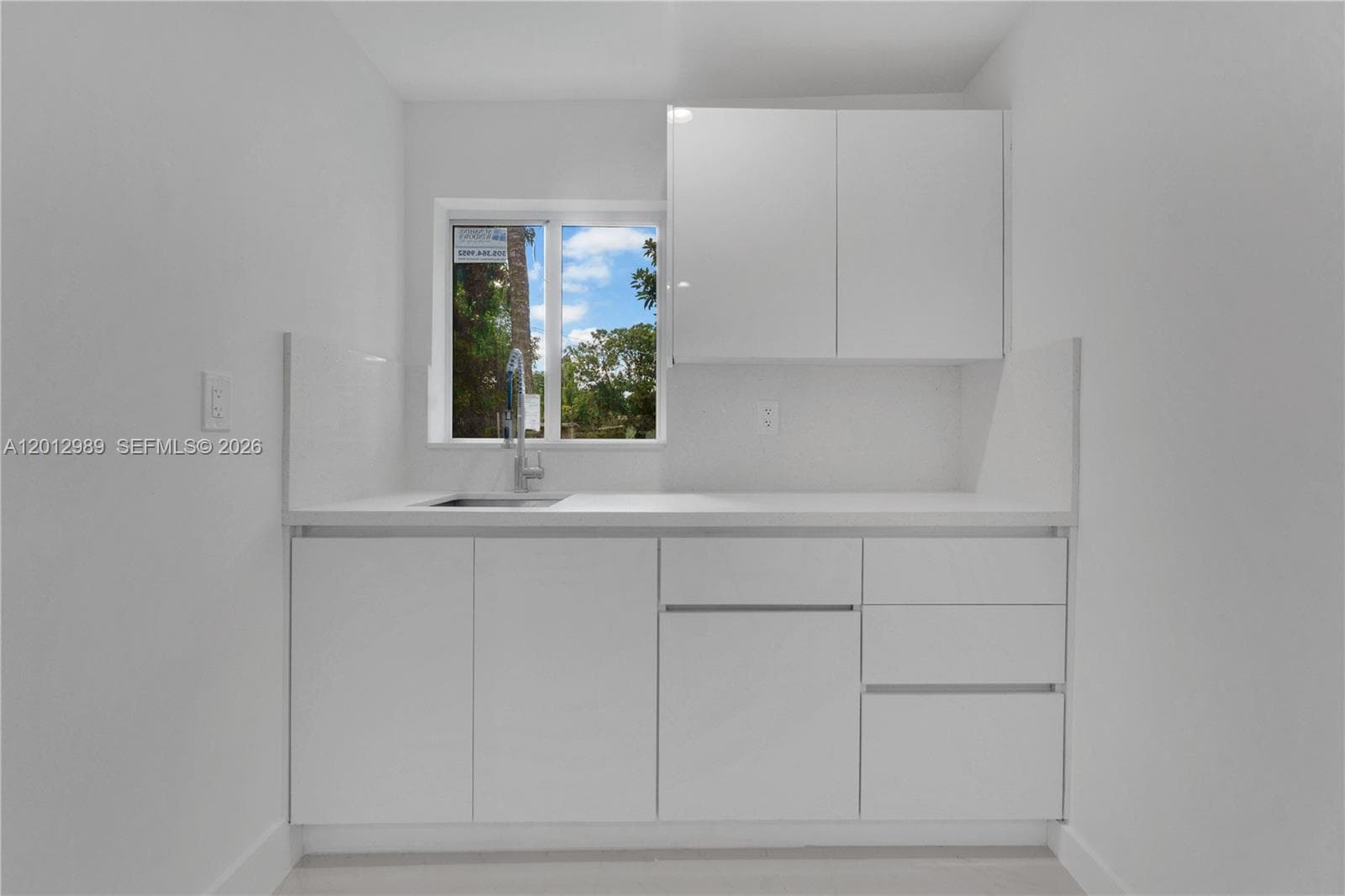 521 NW 33rd Ave, Miami FL 33125 — 23