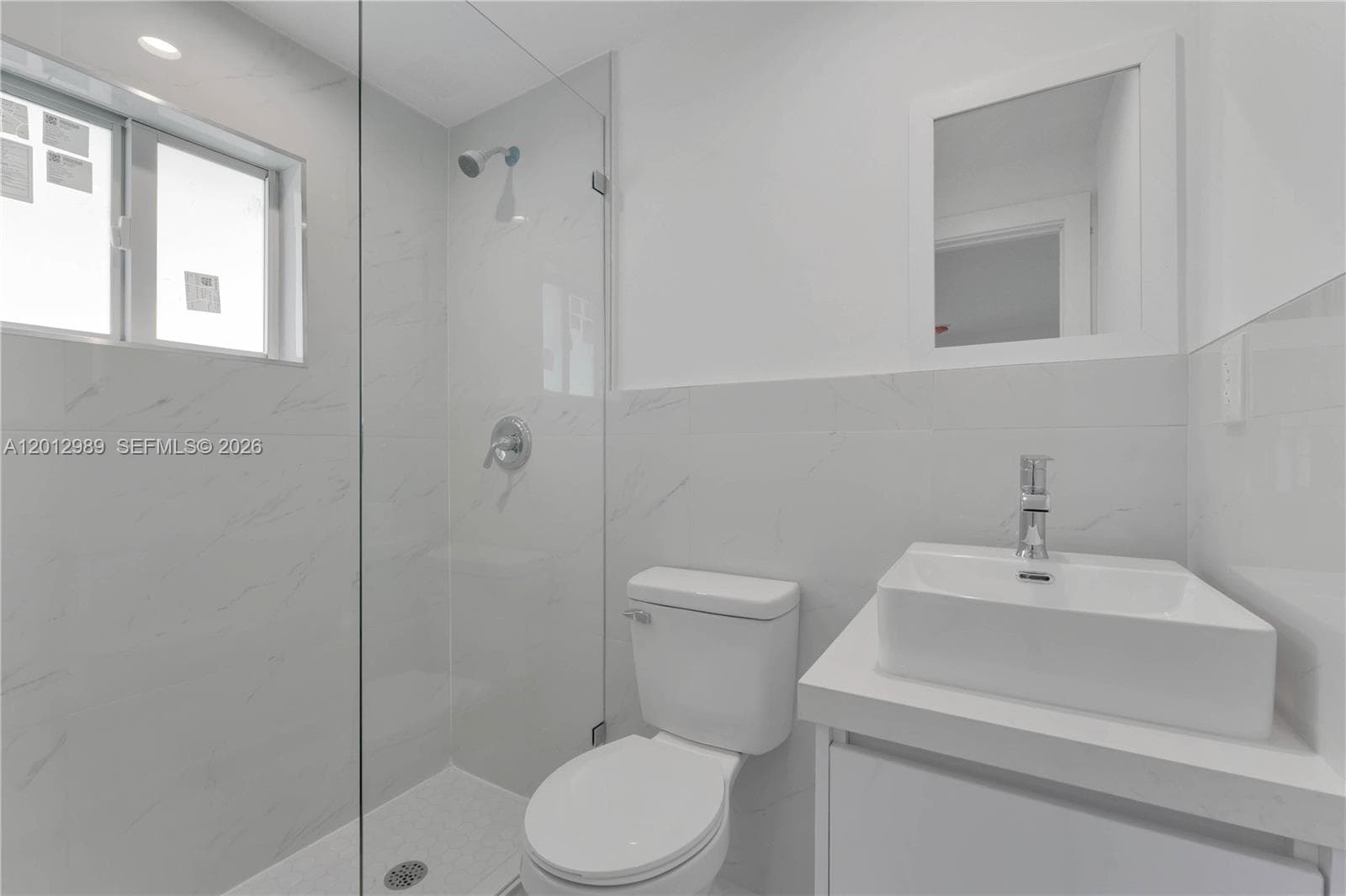 521 NW 33rd Ave, Miami FL 33125 — 27