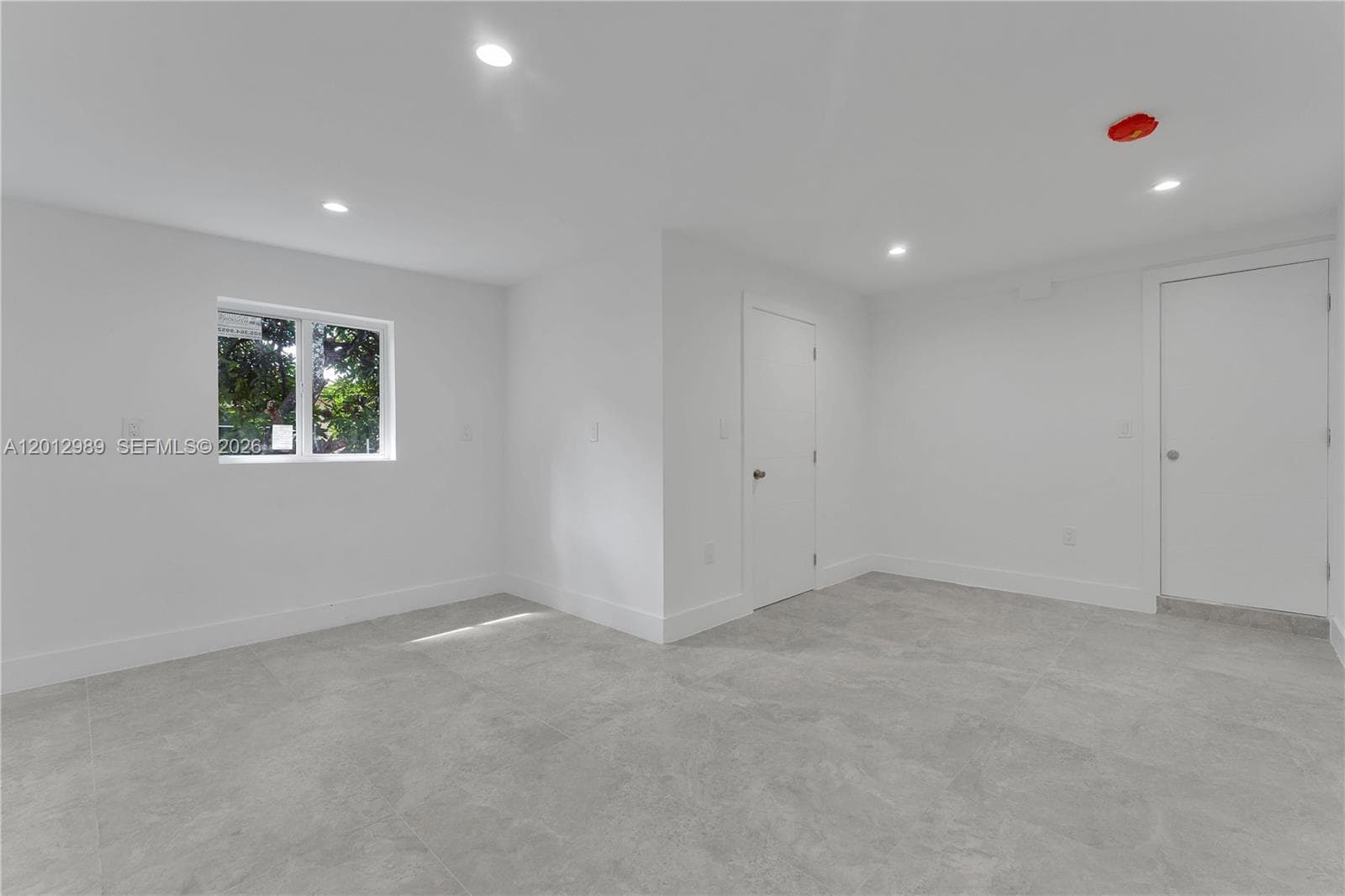 521 NW 33rd Ave, Miami FL 33125 — 17