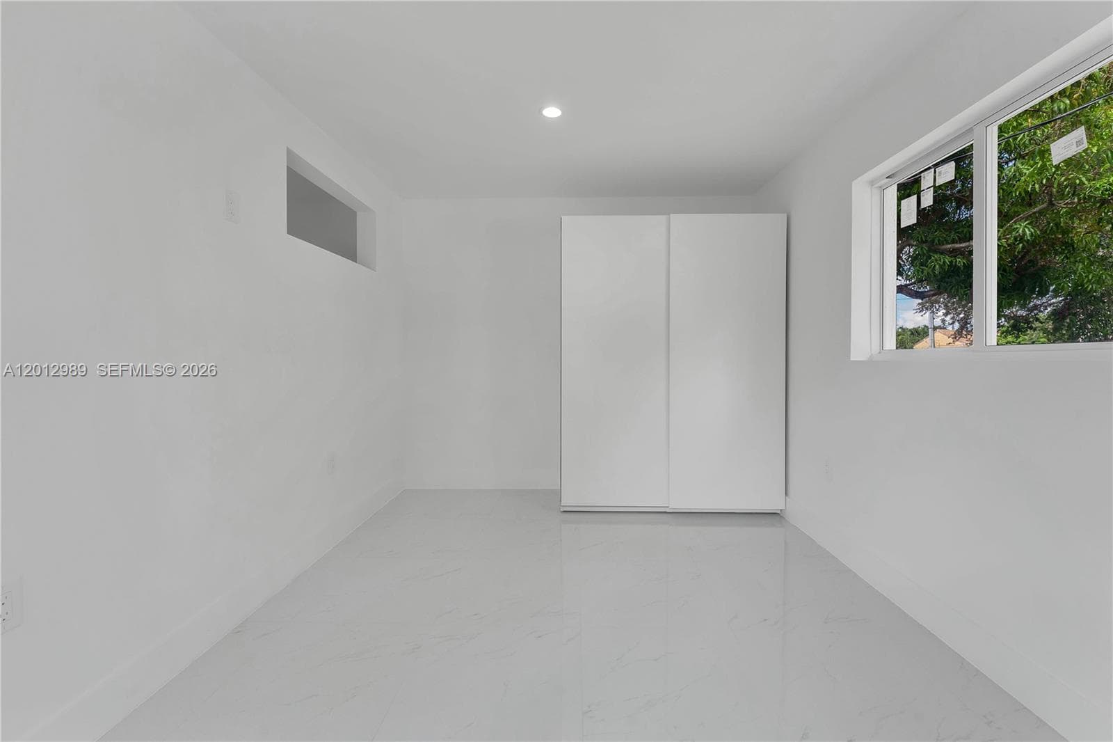 521 NW 33rd Ave, Miami FL 33125 — 26