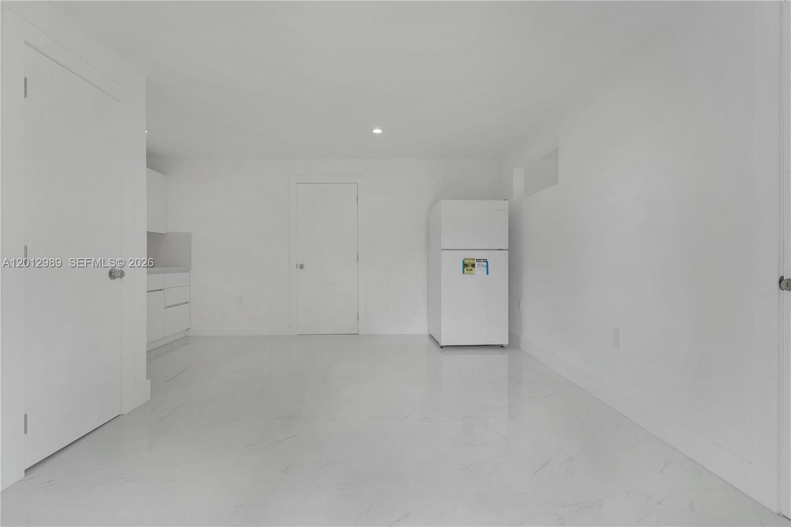 521 NW 33rd Ave, Miami FL 33125 — 24