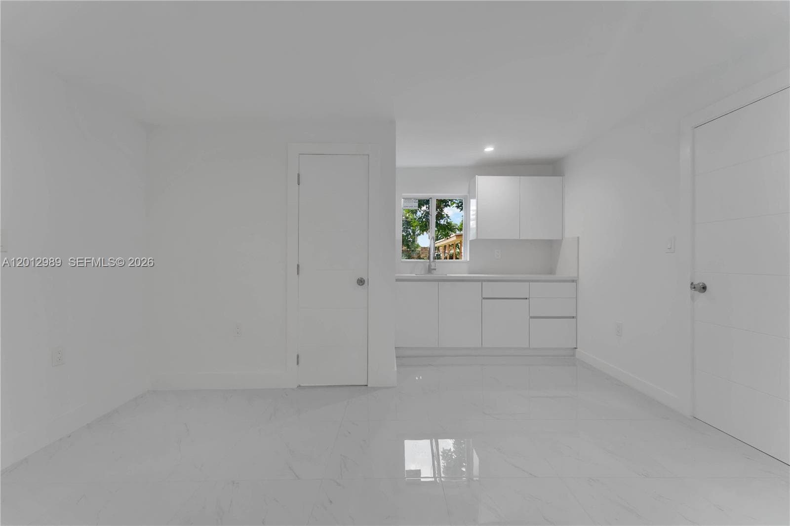 521 NW 33rd Ave, Miami FL 33125 — 18