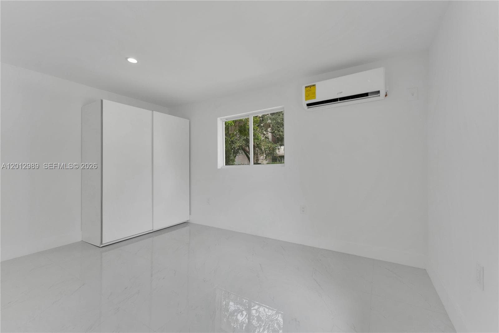 521 NW 33rd Ave, Miami FL 33125 — 25