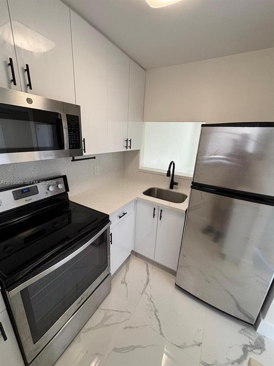 4298 NW South Tamiami Canal Dr # 4, Miami FL 33126 — 5