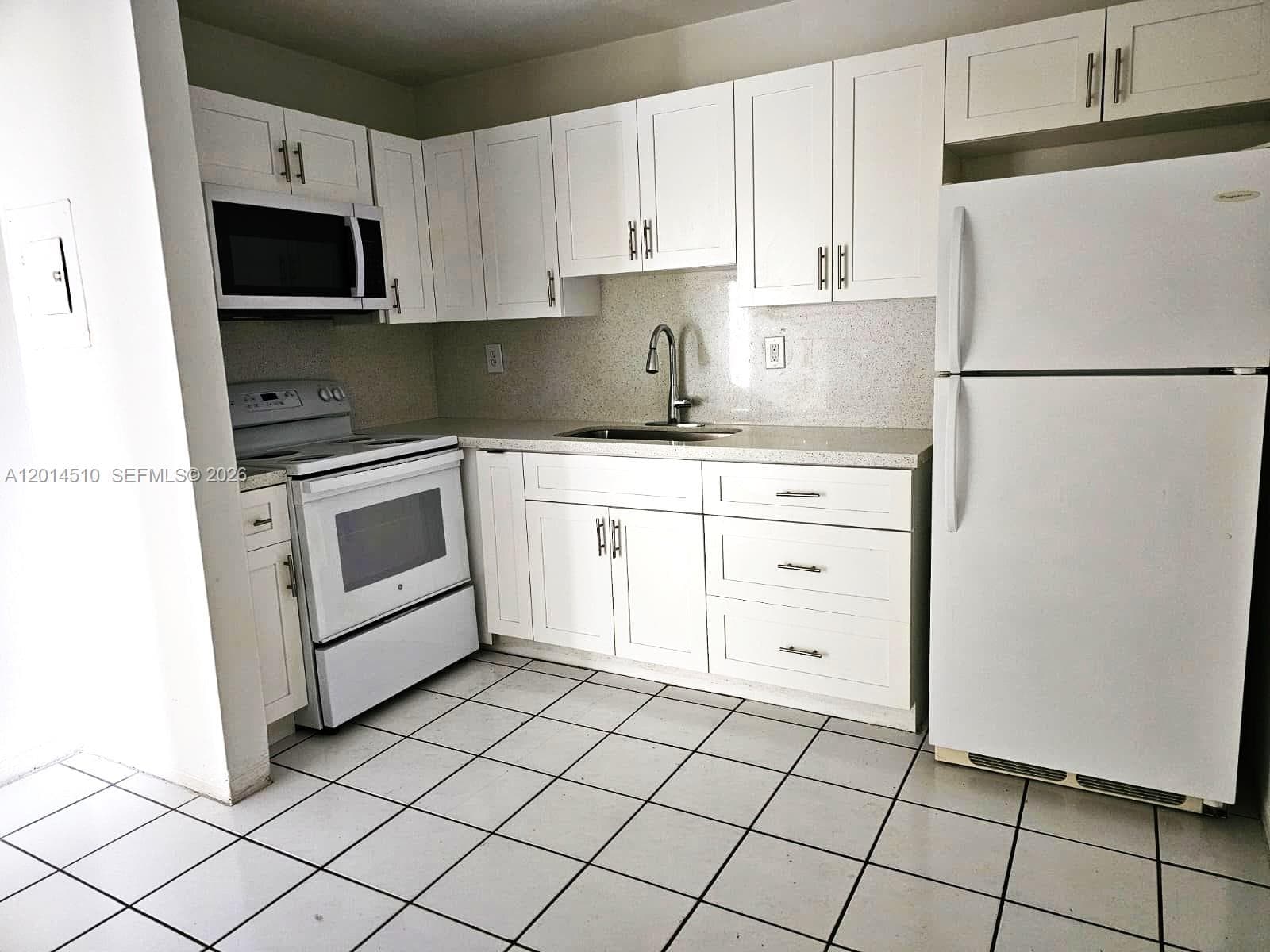 6961 W 14th Ct # 103, Hialeah FL 33014 — 4