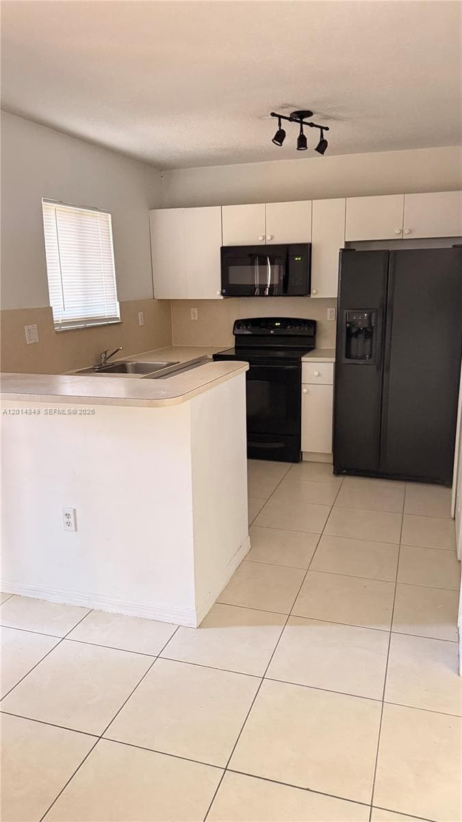 990 NE 33rd Ter # 104, Homestead FL 33033 — 5
